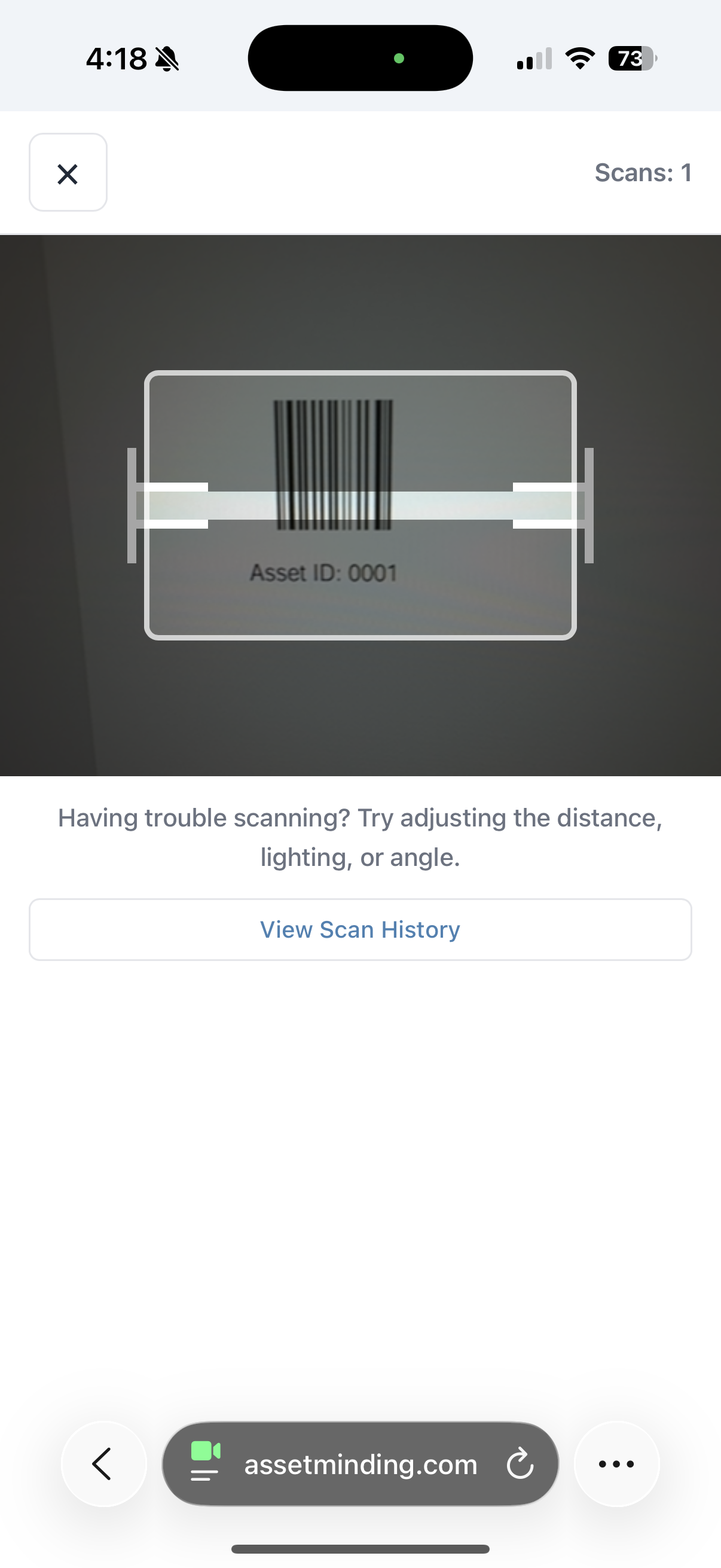 Mobile barcode scanner reading an Asset Minding barcode label
